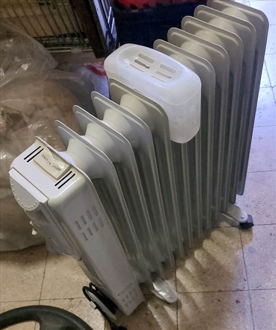 תמונה 2 ,רדיאטור 12 צלעות עם מתקן לחות למכירה בהוד השרון מוצרי חשמל  רדיאטור