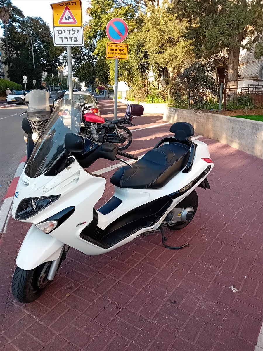 תמונה 1, פיאג`ו X-EVO 250 יד 3   2016 | 59000 קמ