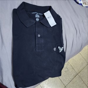 זוג חולצות פולו שחורות חדשות 