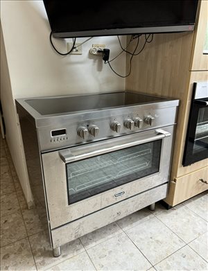 תנור דה לונגי עם כיריים חשמלי 
