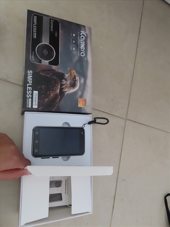 בתמונה: האריזה בתוכו המצלמה והאחריות