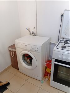 מכונת כביסה כחדשה שנה בשימוש 